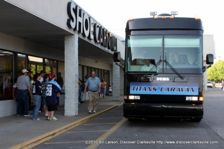 The Titans Caravan XIII tour bus stops in front of the Clarksville, TN Shoe Ca