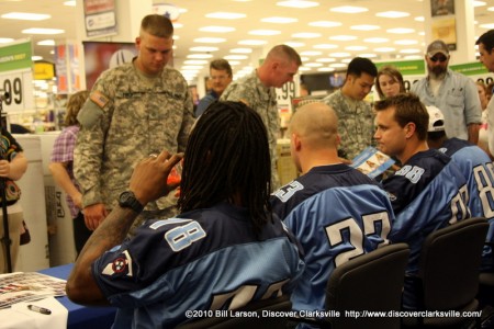 The Tennessee Titans visit with soldiers at the Fort Campbell PX.