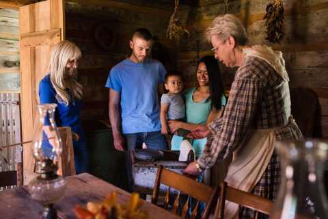 The Hill family enjoys a tour of Historic Collinsville Pioneer Settlement. (Lucas Ryan Chambers)